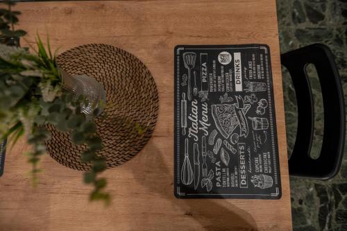 a table with a book on top of a table at Casa 157 in Cercola
