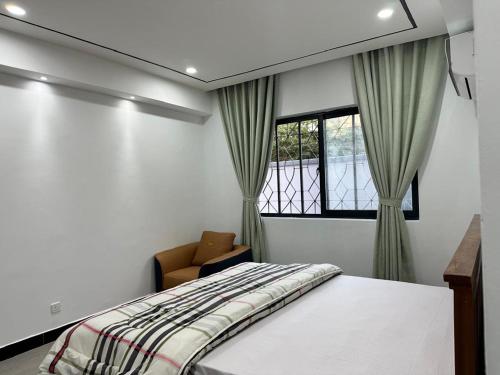 Een bed of bedden in een kamer bij Masaki-2Bedroom-G03