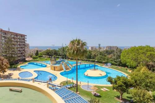 a large water park with two pools and slides at Jupiter in Benalmádena