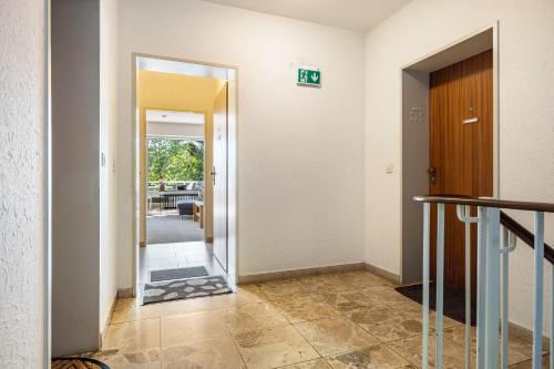 a hallway with a door leading into a room at Ferienwohnung Hurlebusch Hahnenklee in Goslar