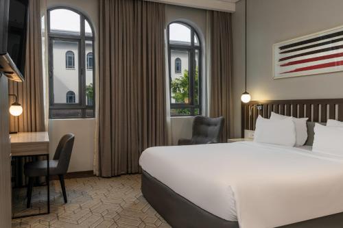 Ένα ή περισσότερα κρεβάτια σε δωμάτιο στο Radisson Lagos Ikeja