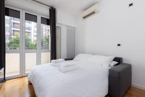 Posteľ alebo postele v izbe v ubytovaní Moscova Design Home