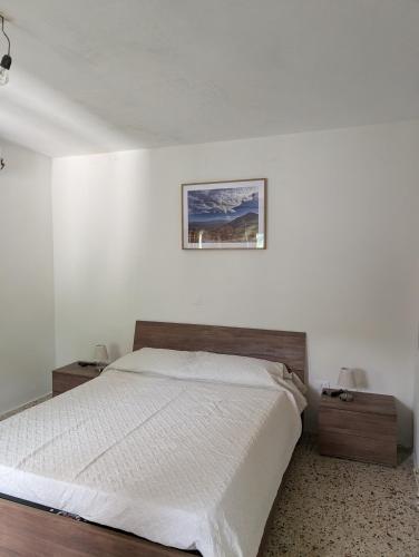 Postel nebo postele na pokoji v ubytování Maison individuelle Farindola santa maria