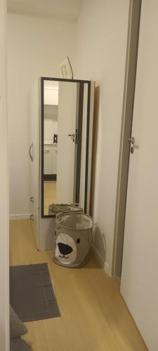 a bathroom with a toilet sitting on the floor next to a mirror at 024 - Apto Studio Liberdade Sé 500'Metrô in Sao Paulo