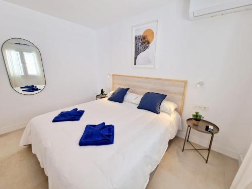 Postel nebo postele na pokoji v ubytování Deluxe Apartamento Masmar