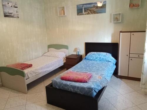 Postel nebo postele na pokoji v ubytování alchiccodoro