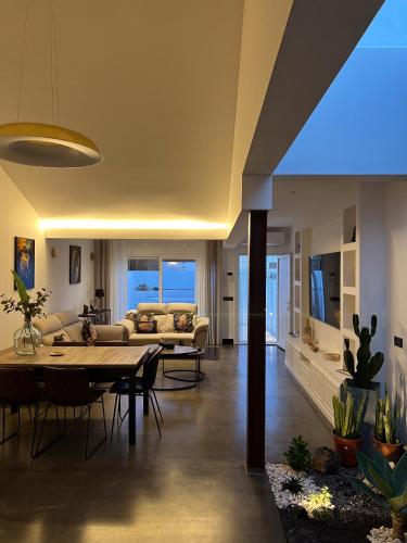a living room with a couch and a table at Garden House, Playa Honda in Arrecife