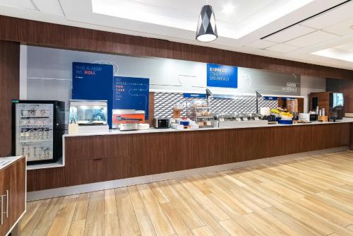 a grocery store with a counter in a store at Holiday Inn Express & Suites Walterboro by IHG in Walterboro