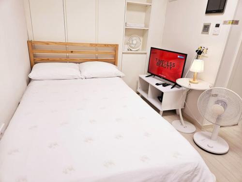 Ένα ή περισσότερα κρεβάτια σε δωμάτιο στο Apartment within a 1-minute walk from the 3-minute bus stop at Gochon Station