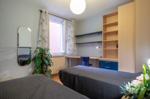 Postel nebo postele na pokoji v ubytování Sharazad