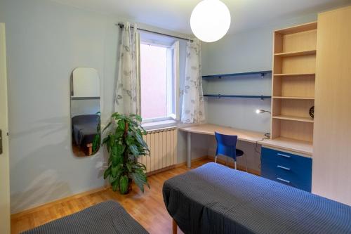 Postel nebo postele na pokoji v ubytování Sharazad