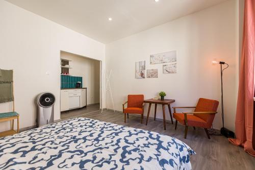 A bed or beds in a room at Best View Apartments