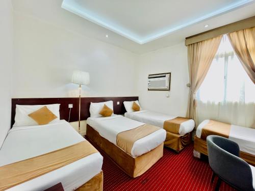 Katil atau katil-katil dalam bilik di Abed Massoudi Ajyad Hotel