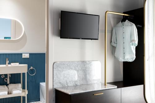 Riva Roomsにあるテレビまたはエンターテインメントセンター