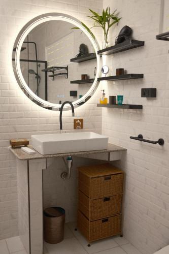 a bathroom with a sink and a mirror at Sunset beach villa 7 O3 villas in Haad Pleayleam