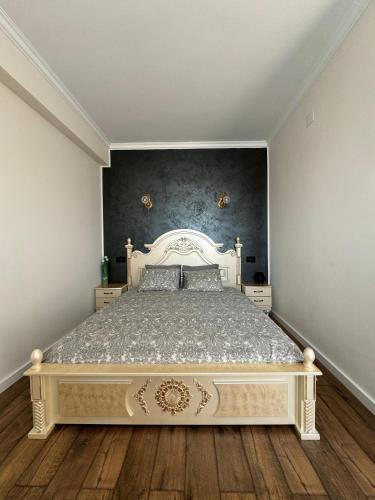 Katil atau katil-katil dalam bilik di Antique Charm Home