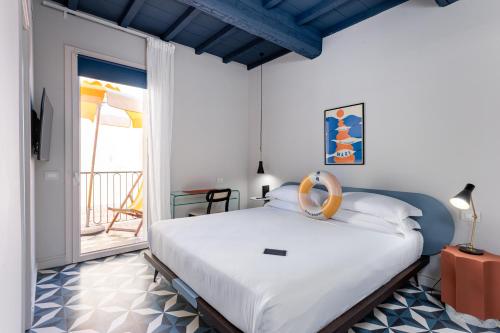 Postel nebo postele na pokoji v ubytování Riva Rooms