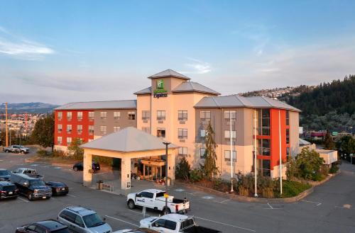 a large building with a parking lot in front of it at Holiday Inn Express Kamloops by IHG in Kamloops