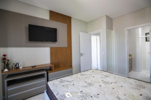 En eller flere senge i et værelse på Al Mare Residenziale