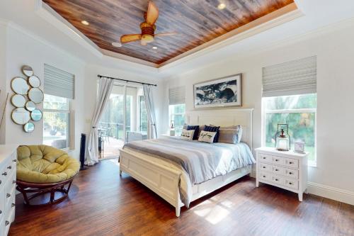 Postel nebo postele na pokoji v ubytování Pool Paradise