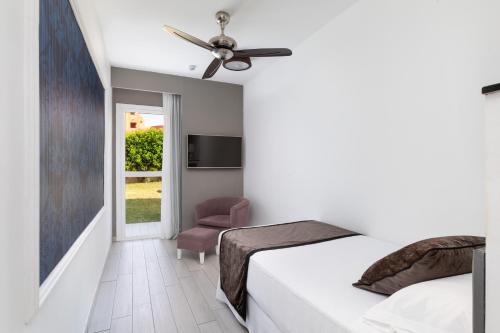 Ένα ή περισσότερα κρεβάτια σε δωμάτιο στο Hotel Riu Palace Tenerife