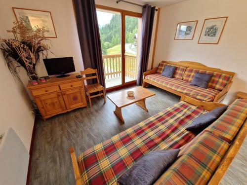 Photo de la galerie de l'établissement Appartement 55m² avec 2 balcons, proche télésiège, 8-10 pers - FR-1-265-197, à Valfréjus