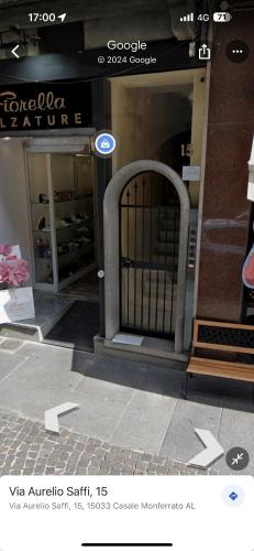 an entrance to a store with a gate in front at Appartamento GEAs in Casale Monferrato