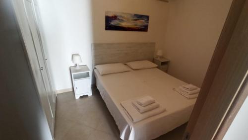 Ένα ή περισσότερα κρεβάτια σε δωμάτιο στο Residence Bellevue