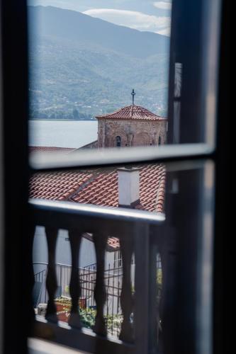 a view of a church from a window at Villa Elena - Dolni Saraj in Ohrid