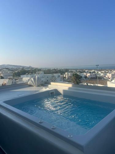 a swimming pool on the roof of a house at Marvarit Villas in Vóthon