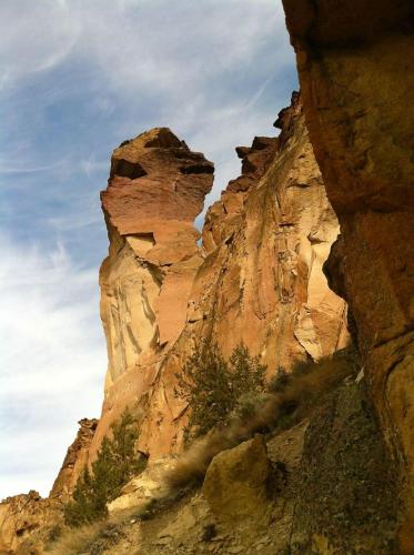 a rocky mountain with a sky in the background at Bluebird Day - High Desert Dwell in Bend