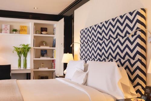 Ένα ή περισσότερα κρεβάτια σε δωμάτιο στο Hotel Cayena Caracas a LHW