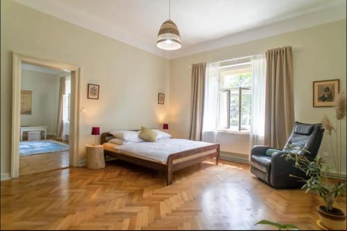 Postel nebo postele na pokoji v ubytování Fara Bošín