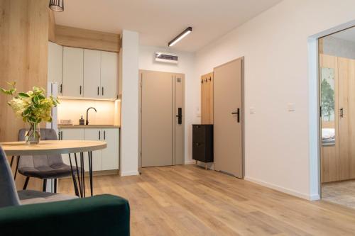 Η κουζίνα ή μικρή κουζίνα στο Drawskie Apartamenty