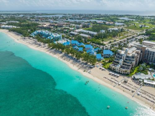 an aerial view of the beach at the resort at Beachfront Condo next to Ritz in West Bay
