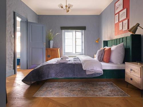 Ein Bett oder Betten in einem Zimmer der Unterkunft Residence Charles Bridge