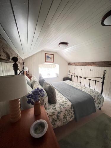 Ένα ή περισσότερα κρεβάτια σε δωμάτιο στο Larchmount House B&B