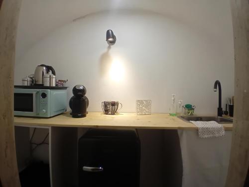 Suite di Pugliaにあるキッチンまたは簡易キッチン