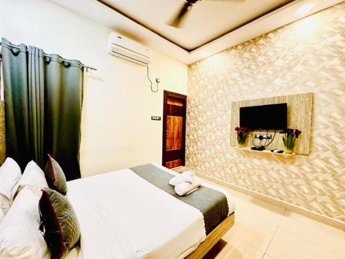 Postel nebo postele na pokoji v ubytování Hotel Sky International- Airport Zone Hyderabad