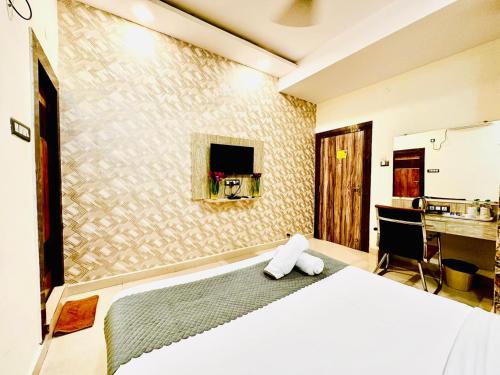 Postel nebo postele na pokoji v ubytování Hotel Sky International- Airport Zone Hyderabad