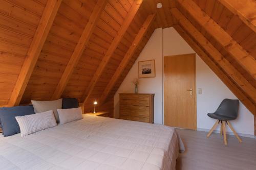 Ένα ή περισσότερα κρεβάτια σε δωμάτιο στο Ferienhaus Knechtsand 34