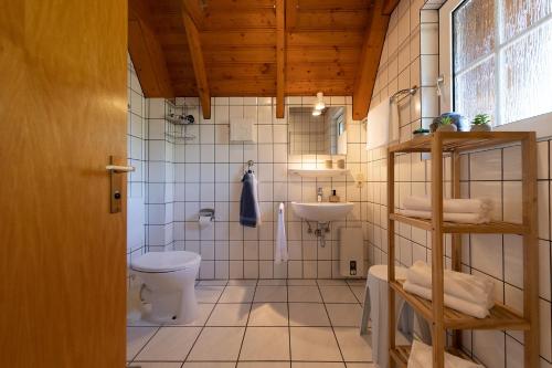 Ένα μπάνιο στο Ferienhaus Knechtsand 34