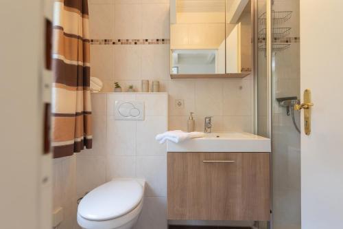 Ένα μπάνιο στο Ferienhaus Vogelsand 10
