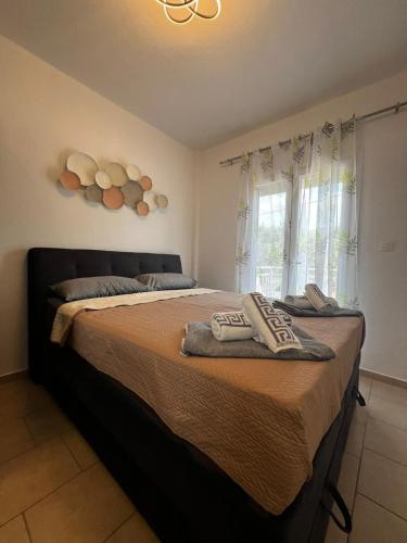 Ένα ή περισσότερα κρεβάτια σε δωμάτιο στο Nissos 2 apartments thassos