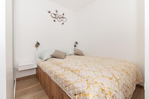 Postel nebo postele na pokoji v ubytování Apartmán Jeannine