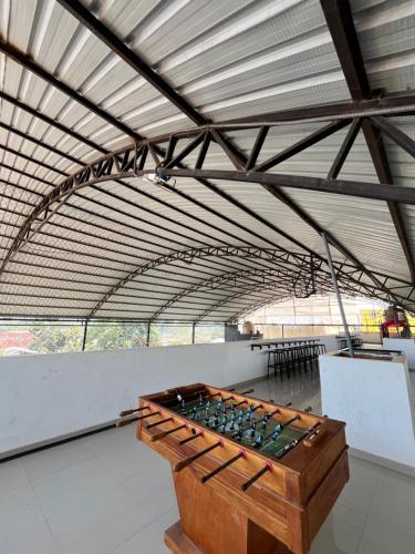 a large room with a chess board in the middle at Hotel Manantay Resort in Pucallpa