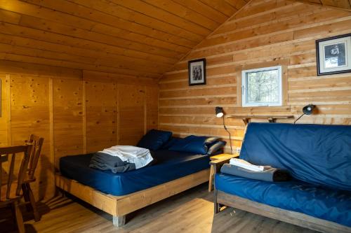 Posezení v ubytování Auberge/Chalet Griffon Aventure