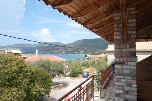 a view from the balcony of a house at Central Apartments in Kardamili