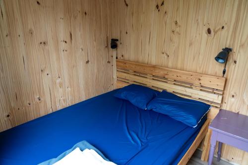 Postel nebo postele na pokoji v ubytování Auberge/Chalet Griffon Aventure