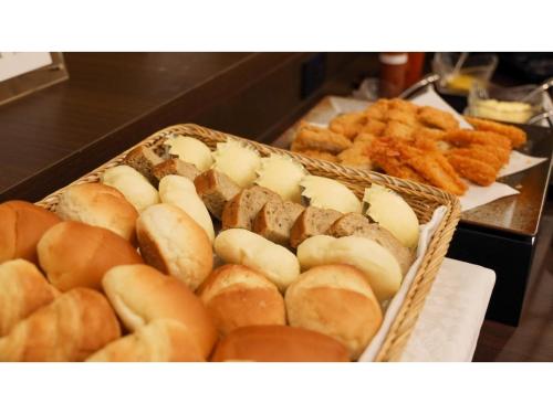 a bunch of breads and pastries in baskets at COCOLAND - Vacation STAY 73944v in Ube